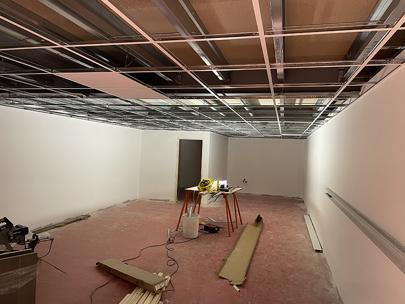 boarding out the partitionings and installing suspended ceiling